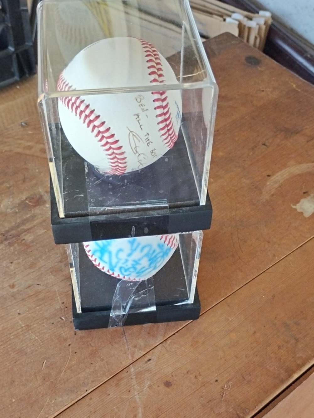 Autographed Baseballs In Cases